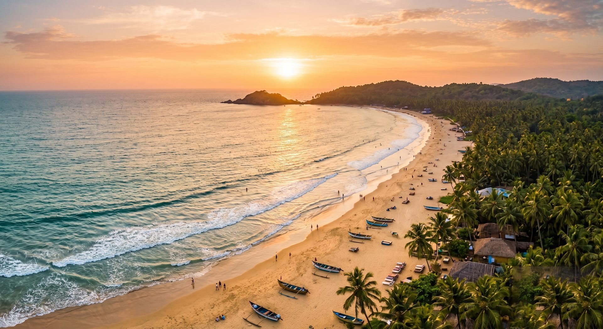 A Goa beach at golden sunset with palms and boats